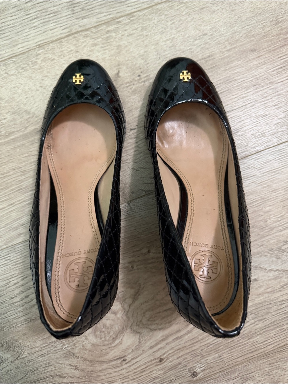 Tory Burch Black Quilted Patent Leather Wedges with Gold Logo